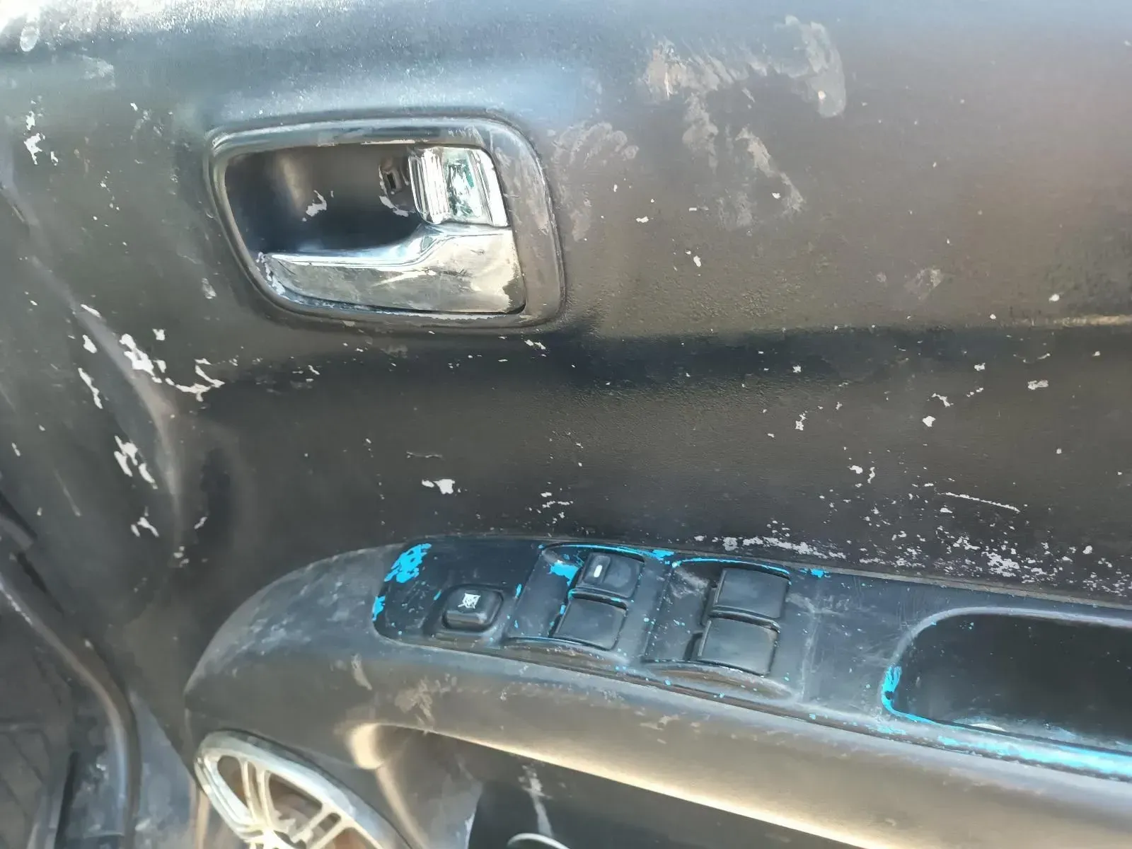 Black Car Door Panel With Peeling Paint — South West 4WD Wreckers In Brisbane, QLD