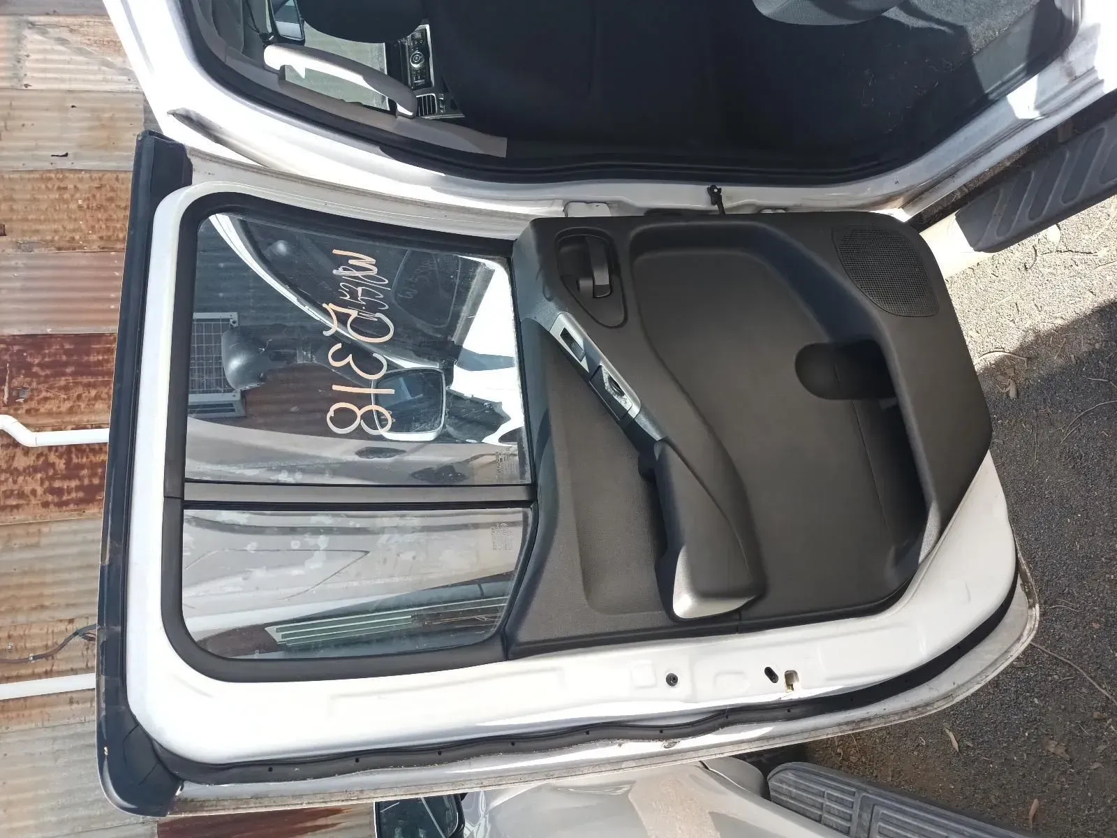 White Car Door, Black Interior Panel, Glass Window, With Writing — South West 4WD Wreckers In Brisbane, QLD