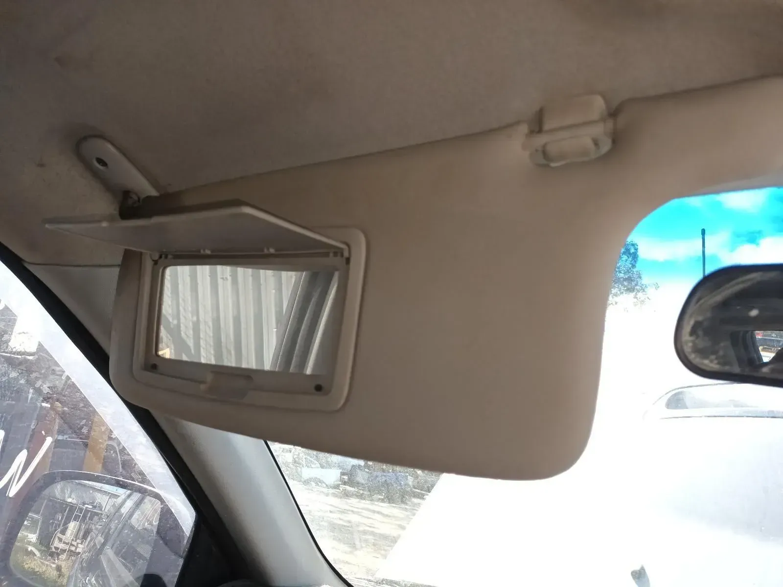 Tan Car Sun Visor With Mirror Open — South West 4WD Wreckers In Brisbane, QLD