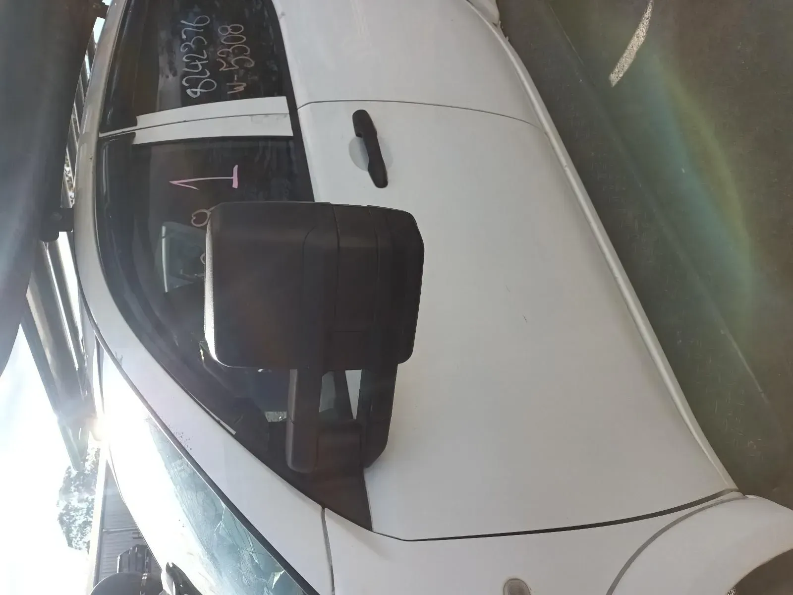 White Vehicle Side View With Black Side Mirror — South West 4WD Wreckers In Brisbane, QLD