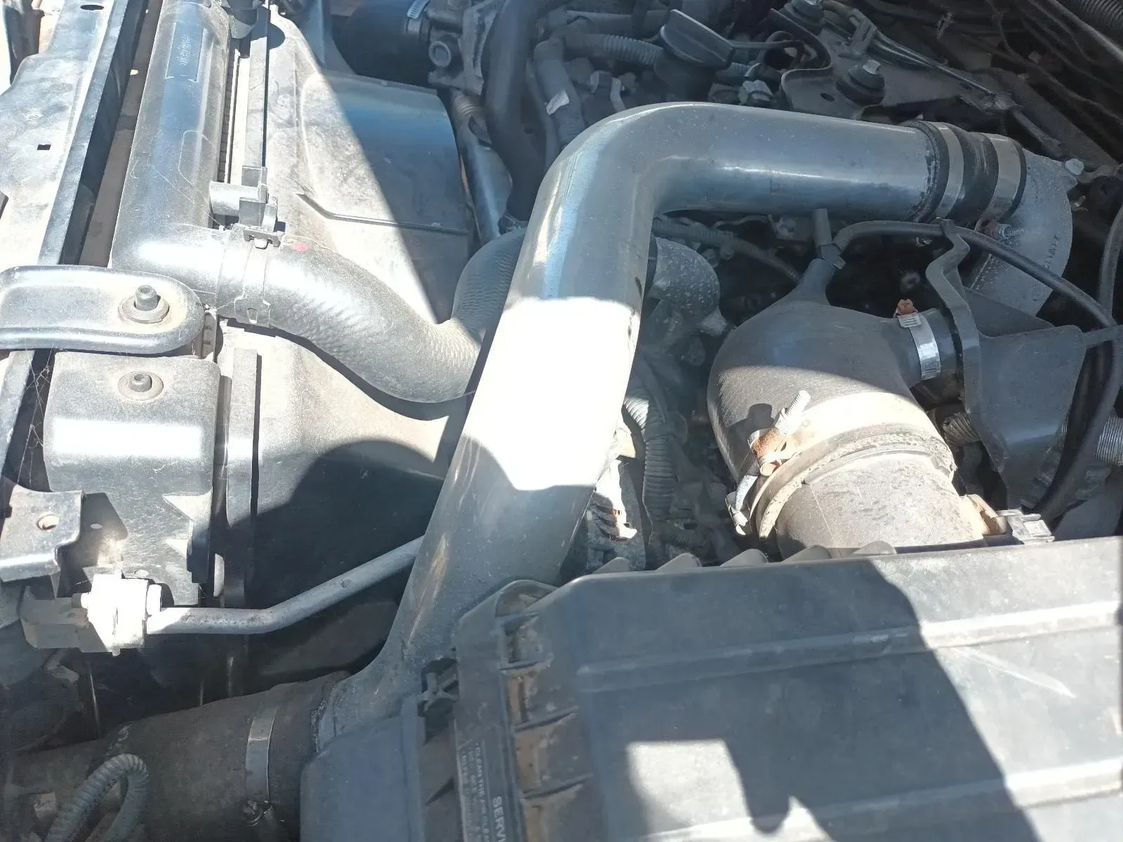 Close-up of a Car Engine With Various Pipes and Hoses Visible — South West 4WD Wreckers In Brisbane, QLD