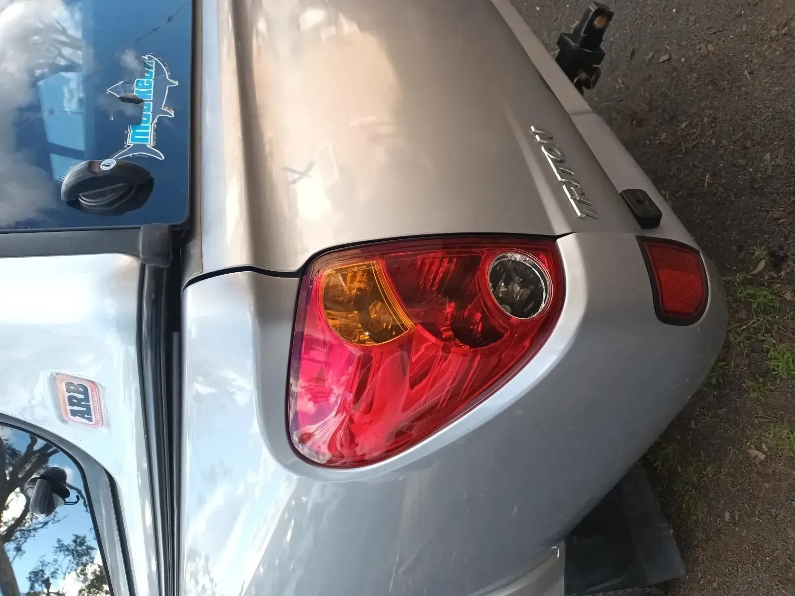 Silver Truck Tail Light With Red and Amber Lights — South West 4WD Wreckers In Brisbane, QLD
