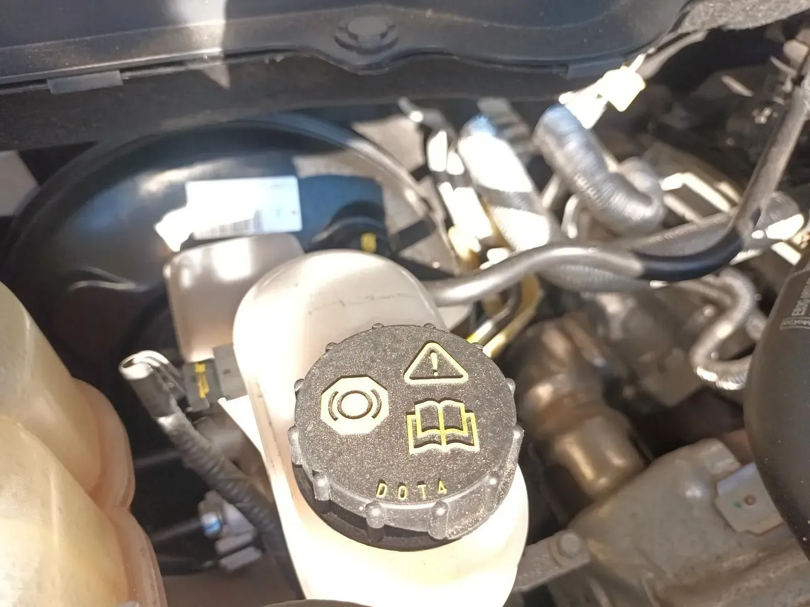 Close-up of a Car's Brake Fluid Reservoir With a Black Cap — South West 4WD Wreckers In Brisbane, QLD