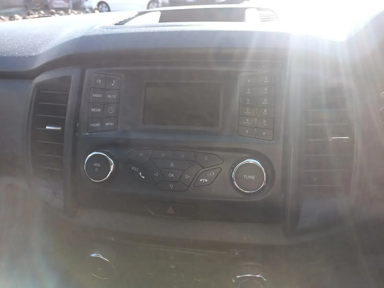 Dashboard of a Vehicle With Radio, Buttons, Air Vents, and a Screen — South West 4WD Wreckers In Brisbane, QLD