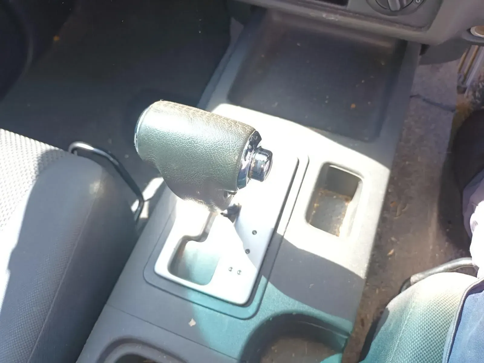 Gear Shift Lever in a Car Console; Black Knob With Silver Details — South West 4WD Wreckers In Brisbane, QLD