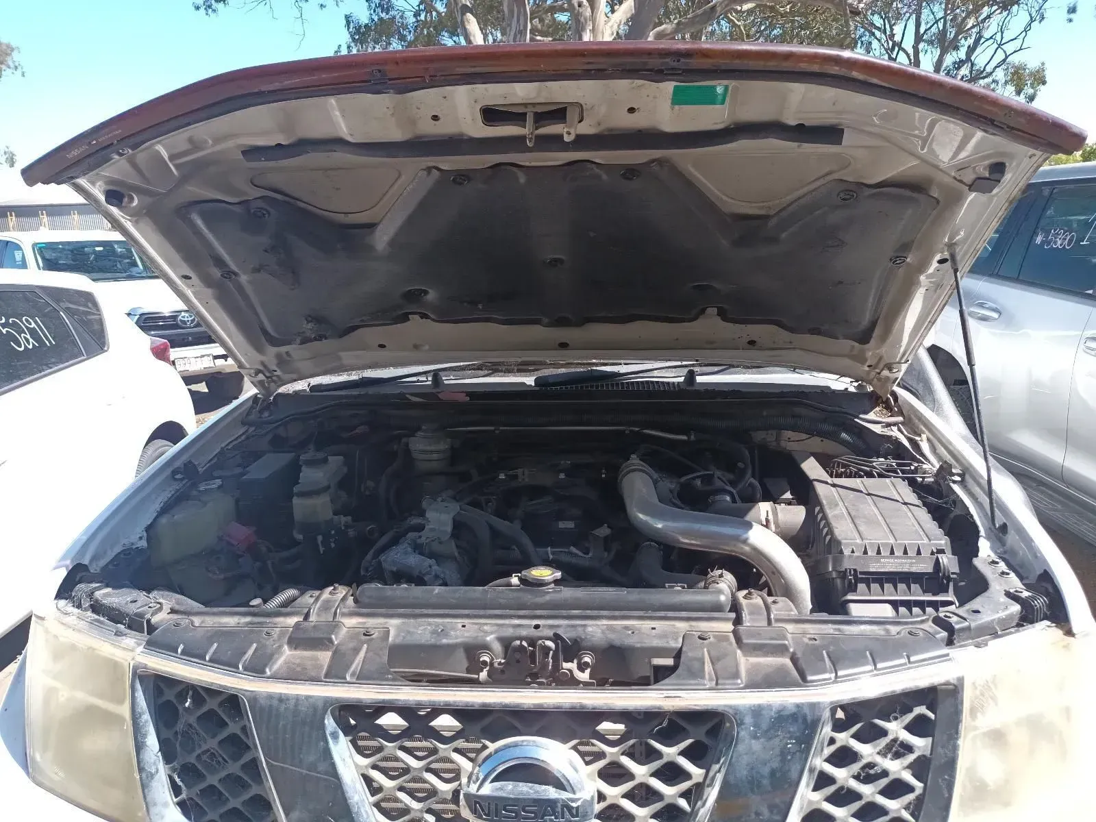 Car Engine With Hood Open, Revealing Mechanical Components — South West 4WD Wreckers In Brisbane, QLD