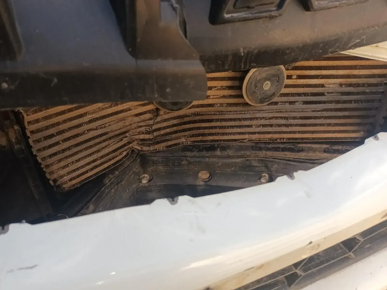 Close-up of a Damaged Car Radiator — South West 4WD Wreckers In Brisbane, QLD
