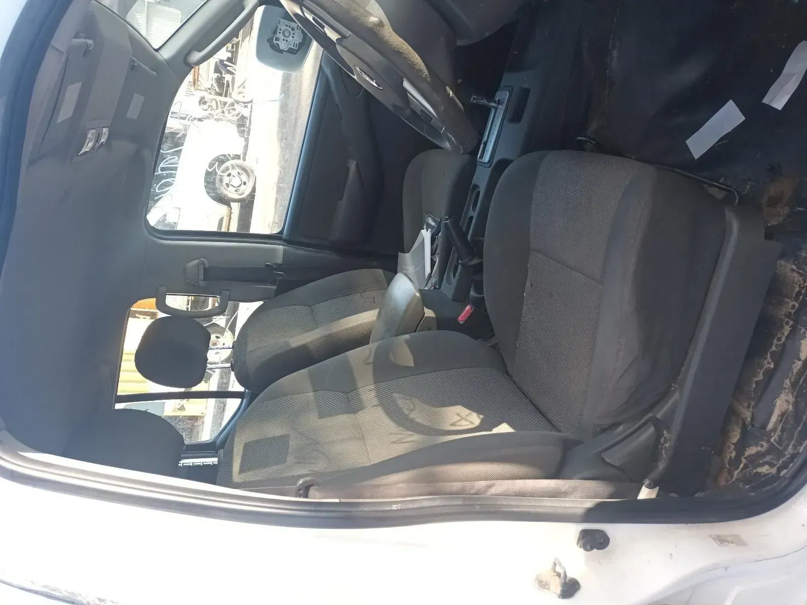 Interior of a Vehicle With Two Front Seats, Steering Wheel, and Dashboard Visible — South West 4WD Wreckers In Brisbane, QLD