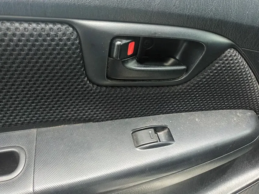 A Close Up of a Car Door With a Red Button on It — South West 4WD Wreckers In Brisbane, QLD