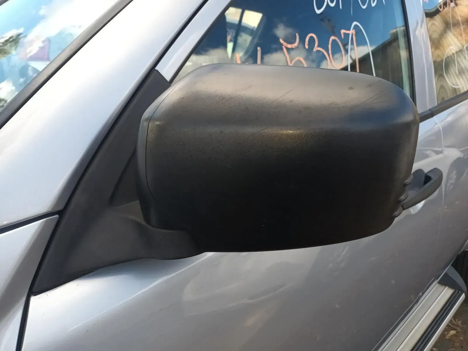 Black Side View Mirror on a Gray Vehicle — South West 4WD Wreckers In Brisbane, QLD