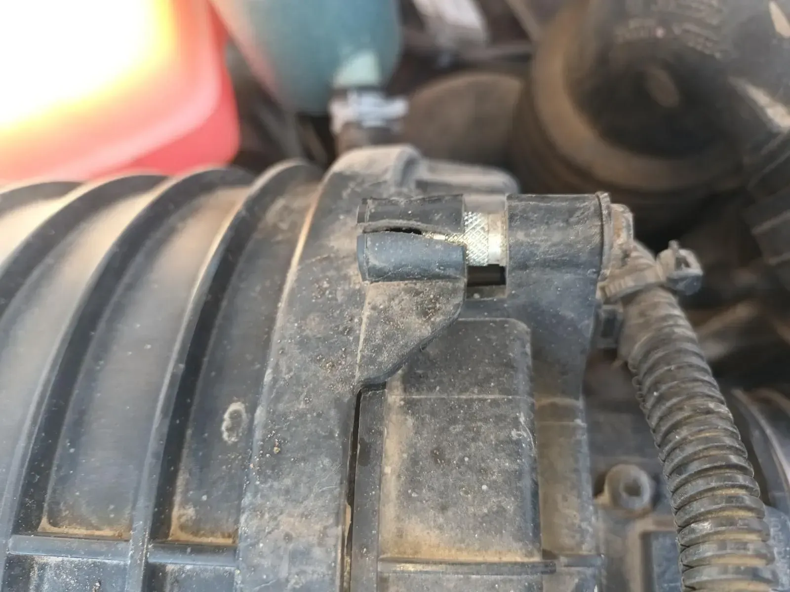 Close-up View of a Black Car Part With a Metal Clasp — South West 4WD Wreckers In Brisbane, QLD