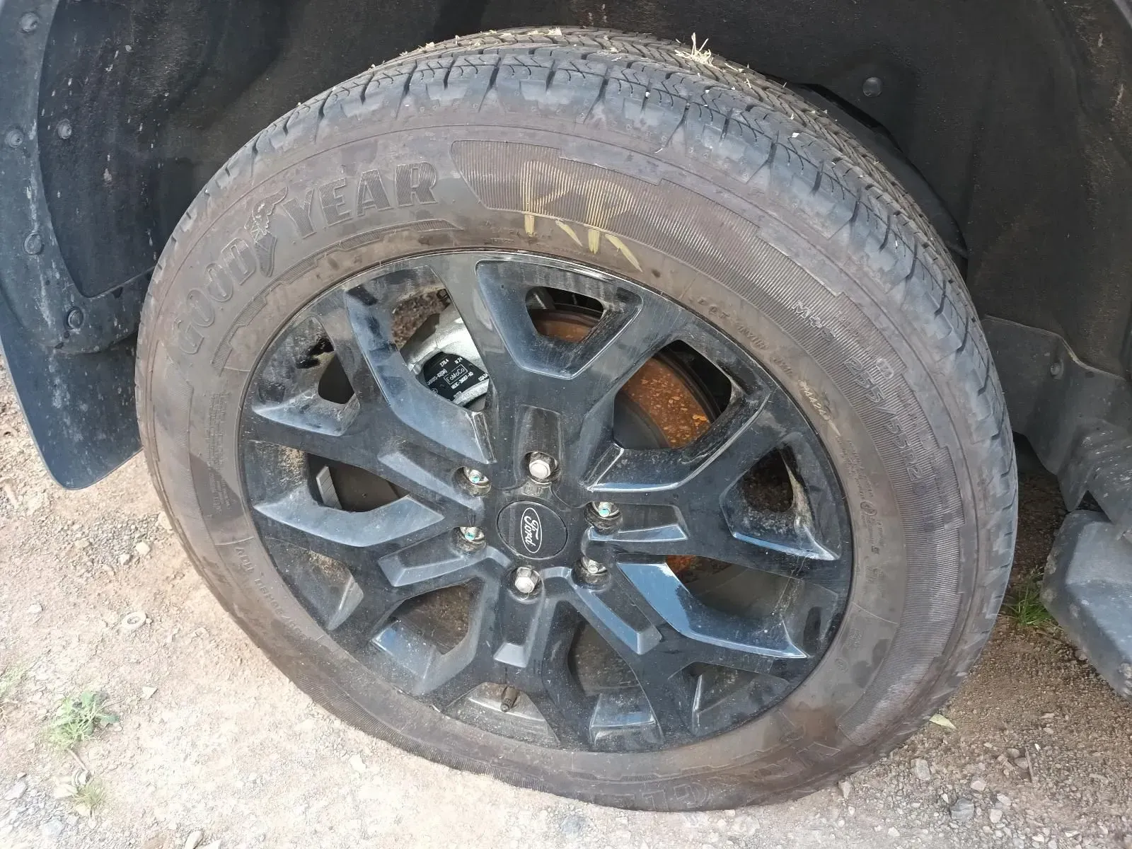 Close-up of a Car Wheel With a Black Rim and a Worn Goodyear Tyre — South West 4WD Wreckers In Brisbane, QLD