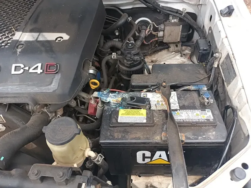 The Engine of a Car With Two Batteries in It — South West 4WD Wreckers In Brisbane, QLD