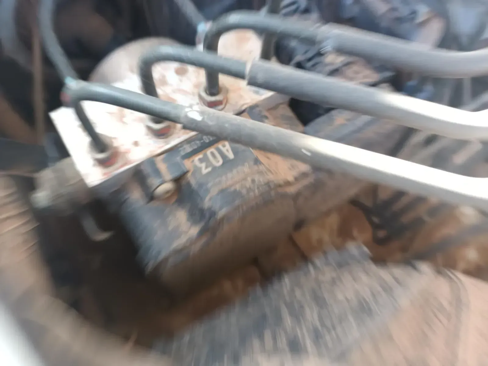 Close-up of a Dirty Car Part With Several Tubes Connected — South West 4WD Wreckers In Brisbane, QLD