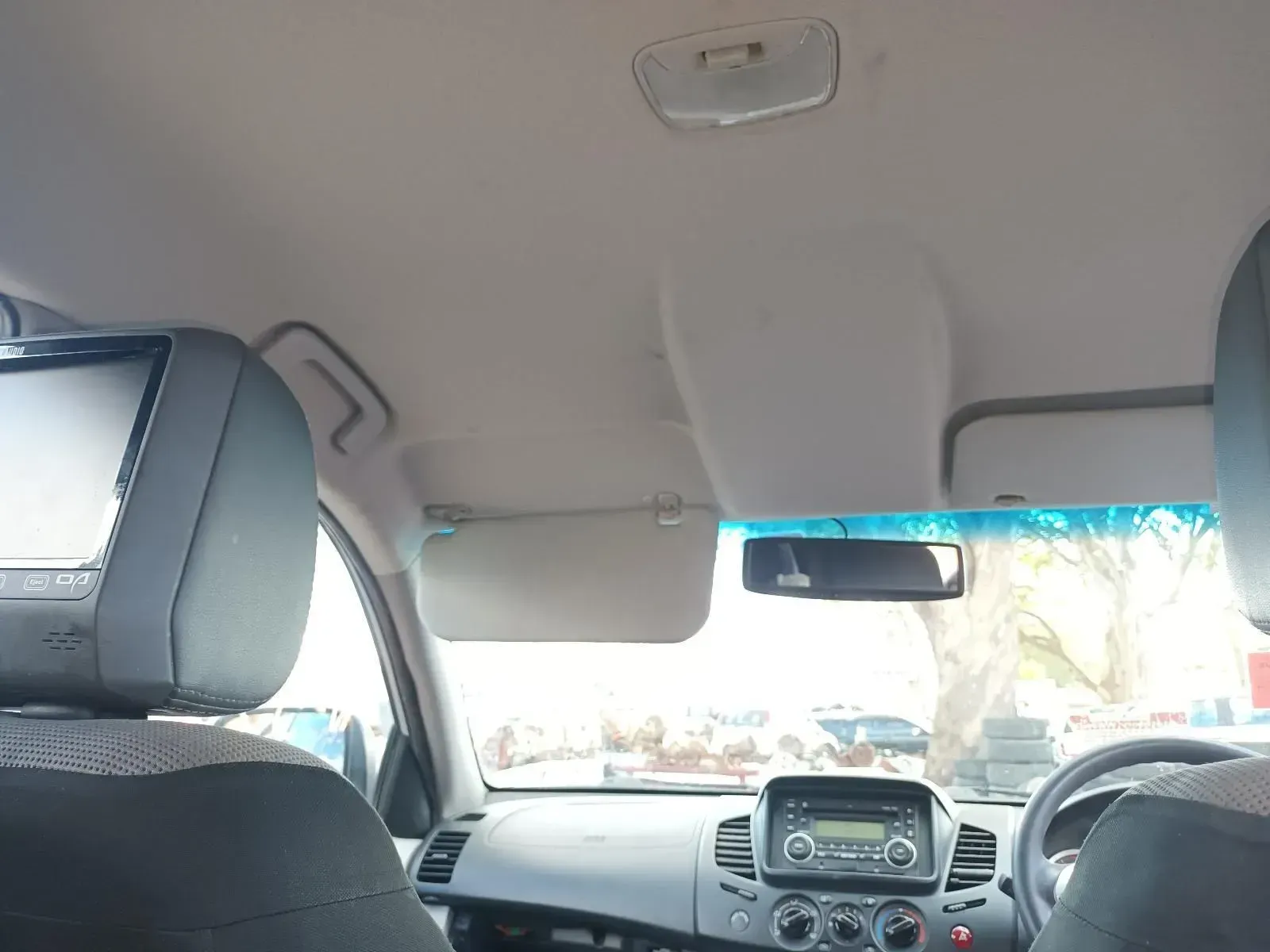Interior of a Car, Showing the Dashboard, Sun Visors, Rearview Mirror — South West 4WD Wreckers In Brisbane, QLD