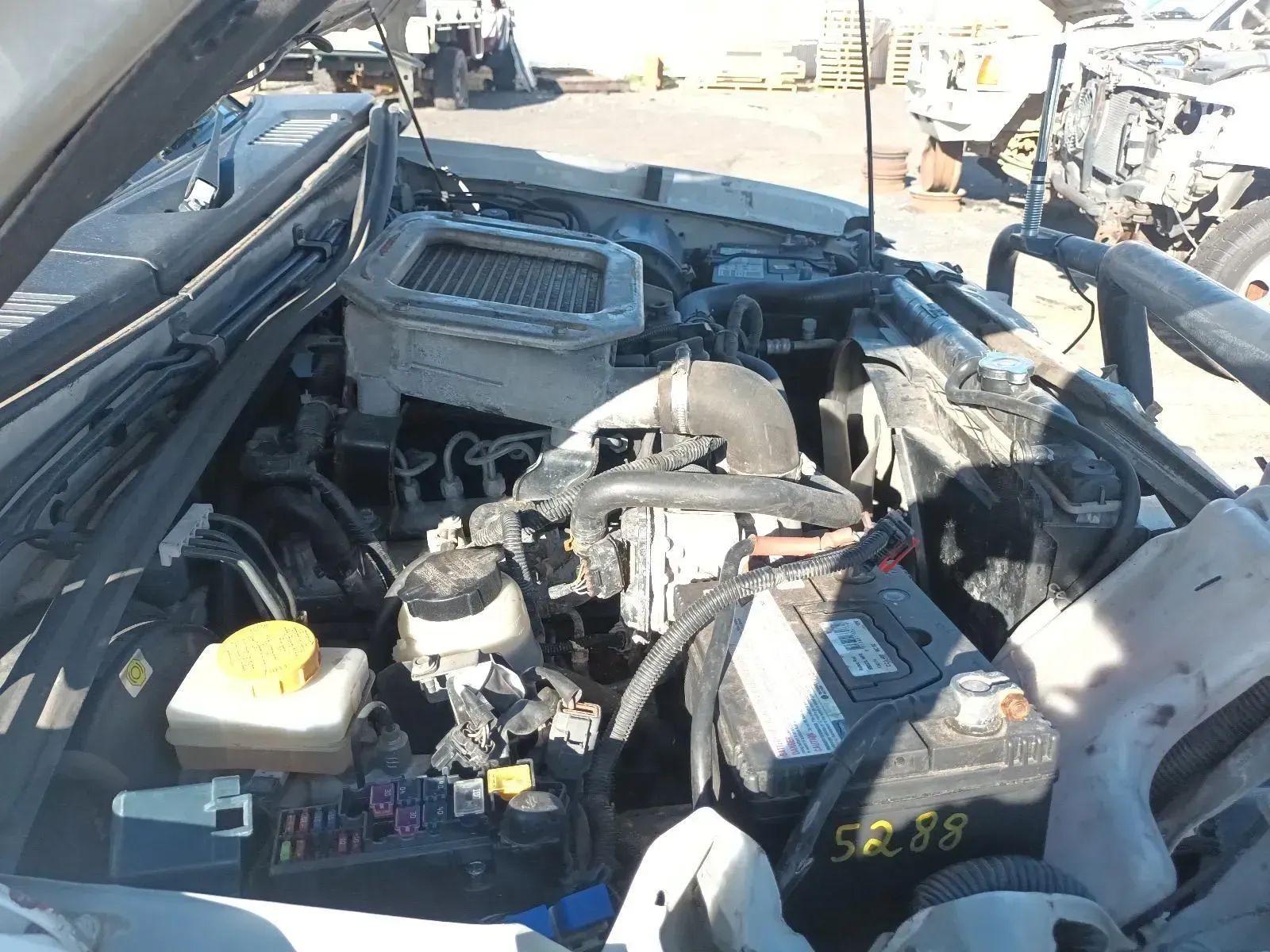 Engine Bay of a Vehicle With Various Components Visible — South West 4WD Wreckers In Brisbane, QLD