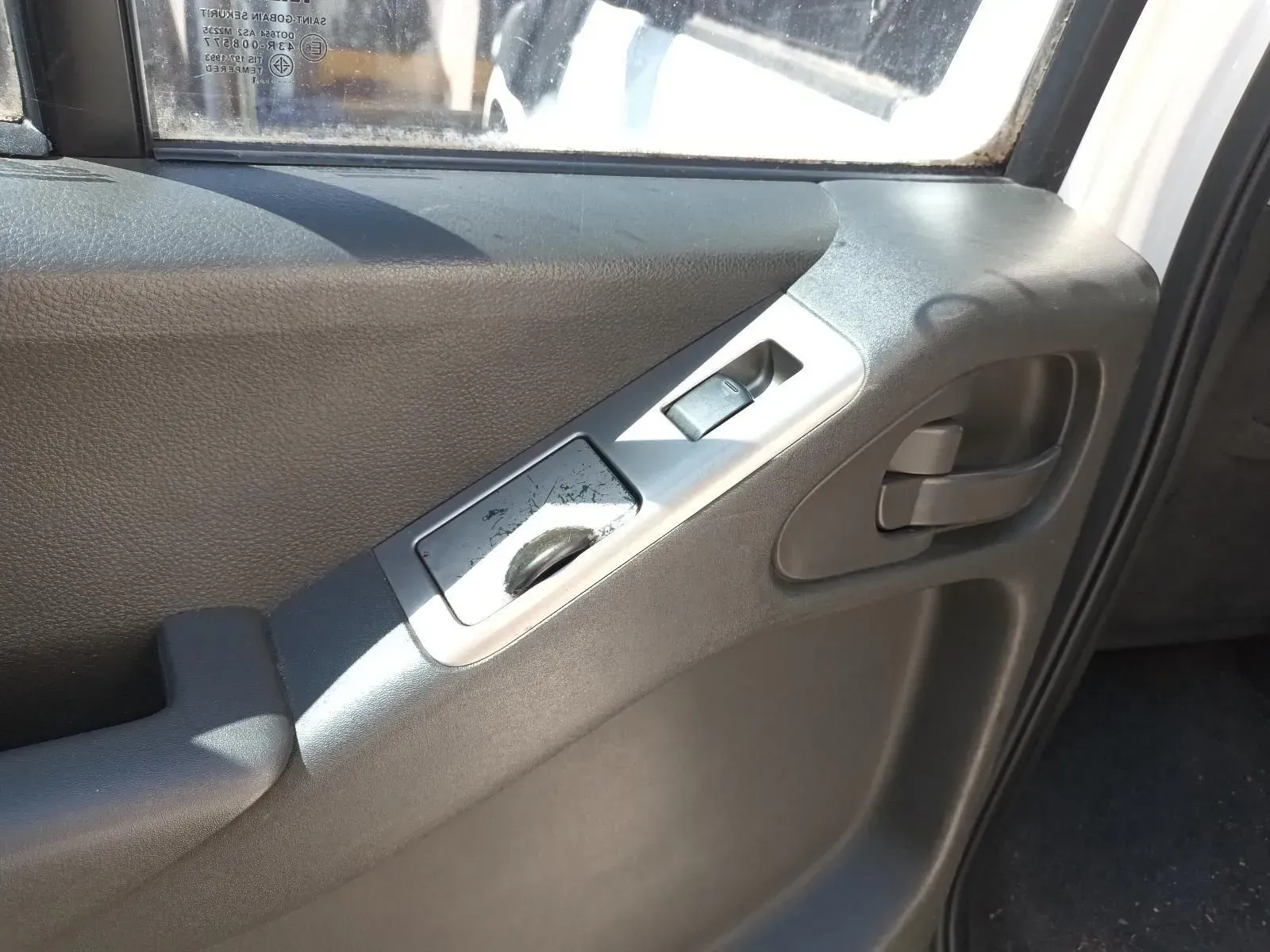 Gray Car Door Interior With Window Controls and Handle — South West 4WD Wreckers In Brisbane, QLD