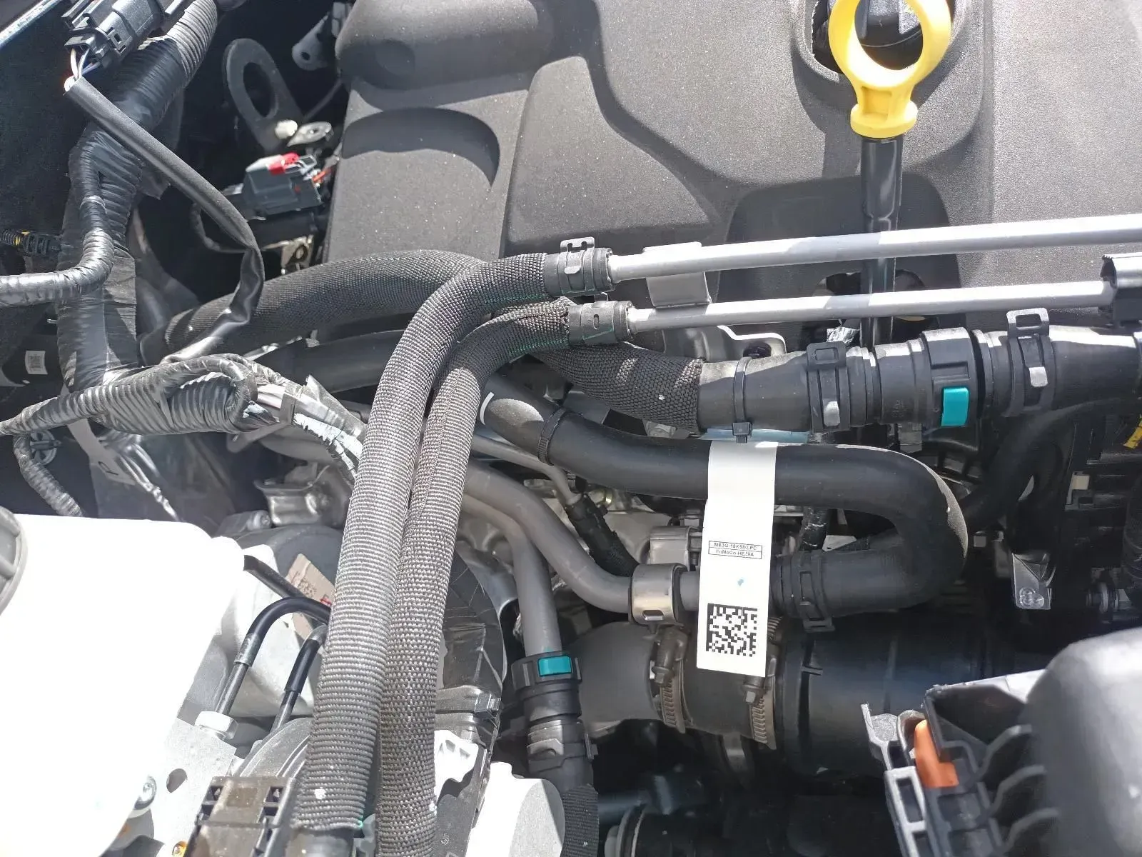 Car Engine Compartment With Hoses, Wires, and Fluid Dipstick — South West 4WD Wreckers In Brisbane, QLD