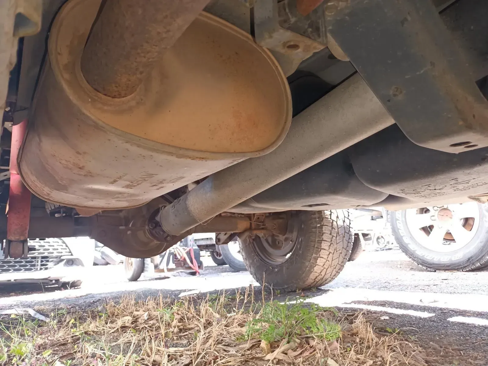 Undercarriage of a Vehicle With a Rusty Exhaust System — South West 4WD Wreckers In Brisbane, QLD