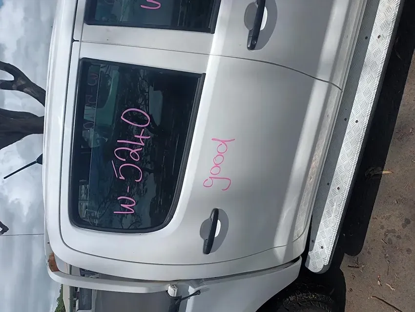 A White Truck With the Word Good Written on the Door — South West 4WD Wreckers In Brisbane, QLD
