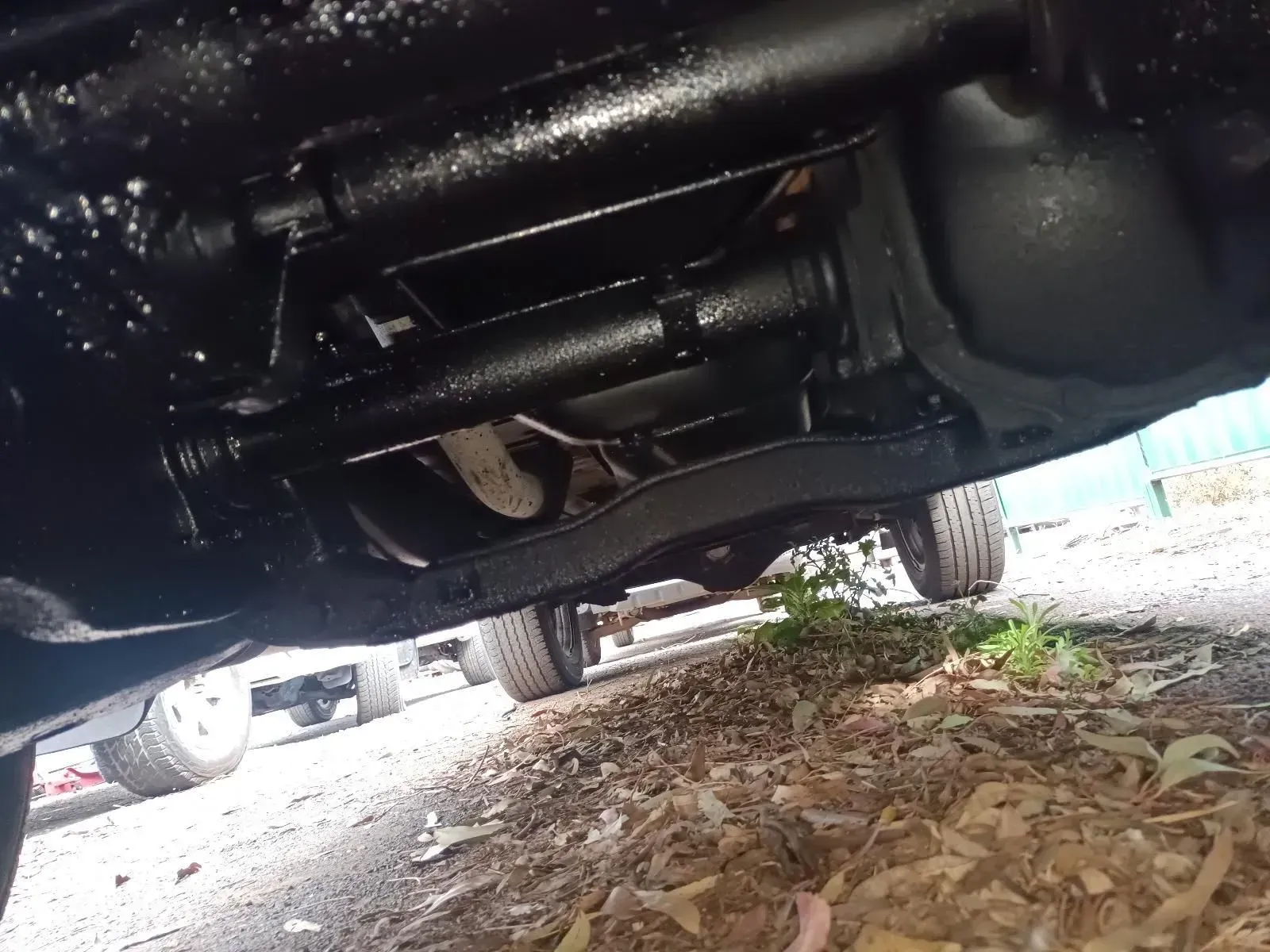 Underside of a Black Painted Vehicle Chassis, Showing Drive Shaft — South West 4WD Wreckers In Brisbane, QLD