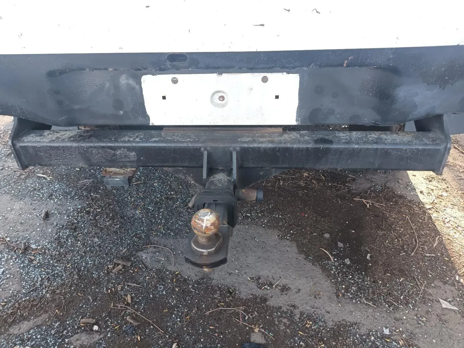 Black Vehicle Bumper With a Trailer Hitch and a Blank License Plate Mount — South West 4WD Wreckers In Brisbane, QLD