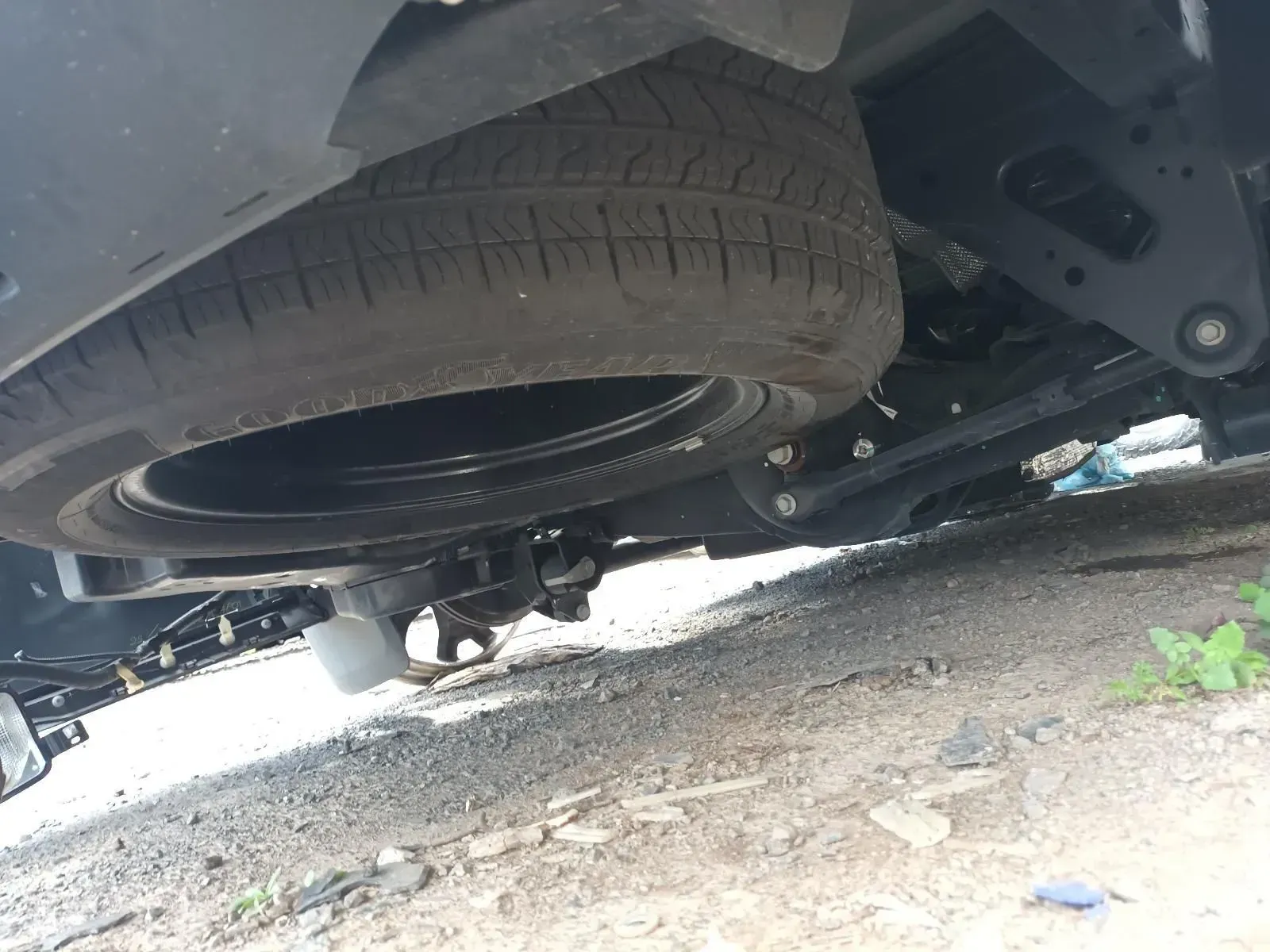 Underside of Vehicle Showing Spare Tyre Mounted Beneath the Chassis — South West 4WD Wreckers In Brisbane, QLD