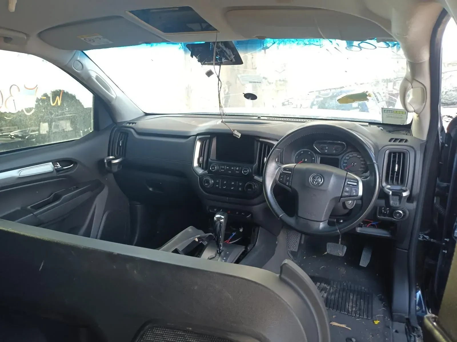 Interior View of a Black Car Dashboard and Controls — South West 4WD Wreckers In Brisbane, QLD