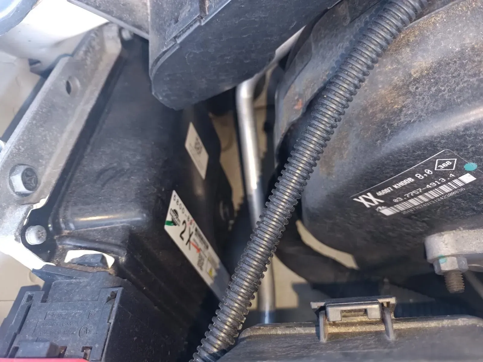 Black Engine Components and Tubing in a Car Engine Bay — South West 4WD Wreckers In Brisbane, QLD