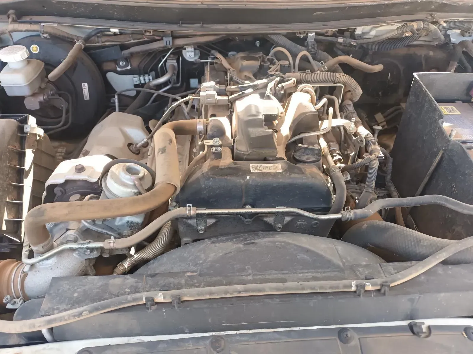 Engine of a Vehicle, Dusty and Showing Various Components — South West 4WD Wreckers In Brisbane, QLD