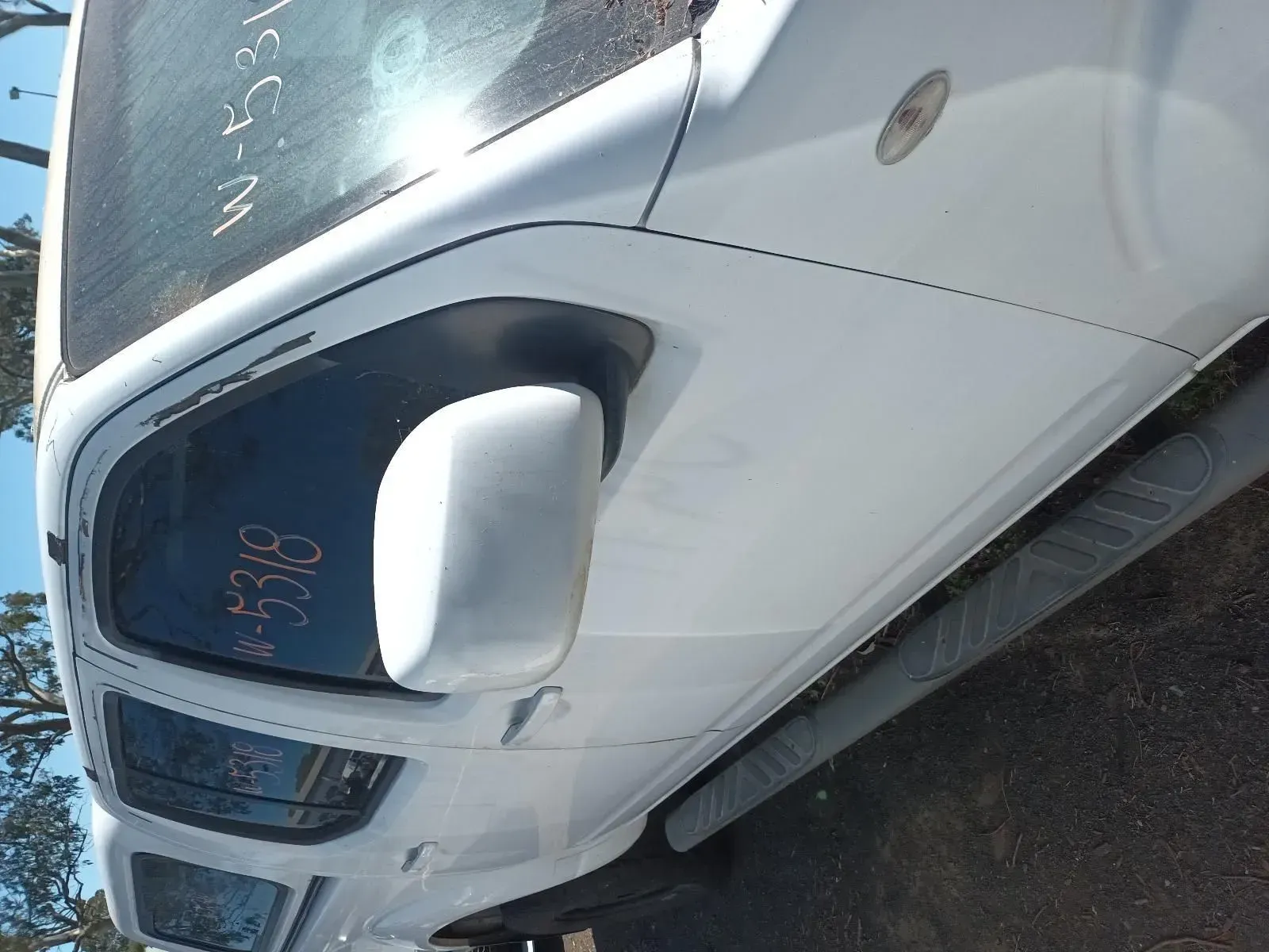 White Nissan Truck's Side Mirror and Door — South West 4WD Wreckers In Brisbane, QLD