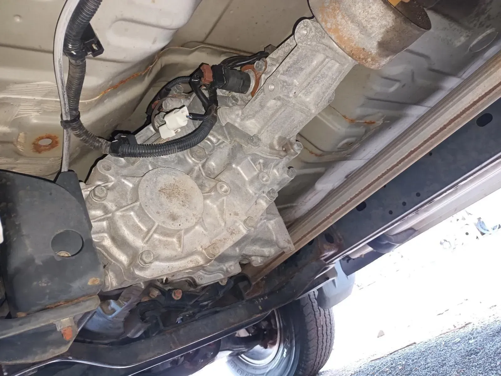 Underside of a Vehicle Showing a Transfer Case, Metal Frame, and Wiring — South West 4WD Wreckers In Brisbane, QLD