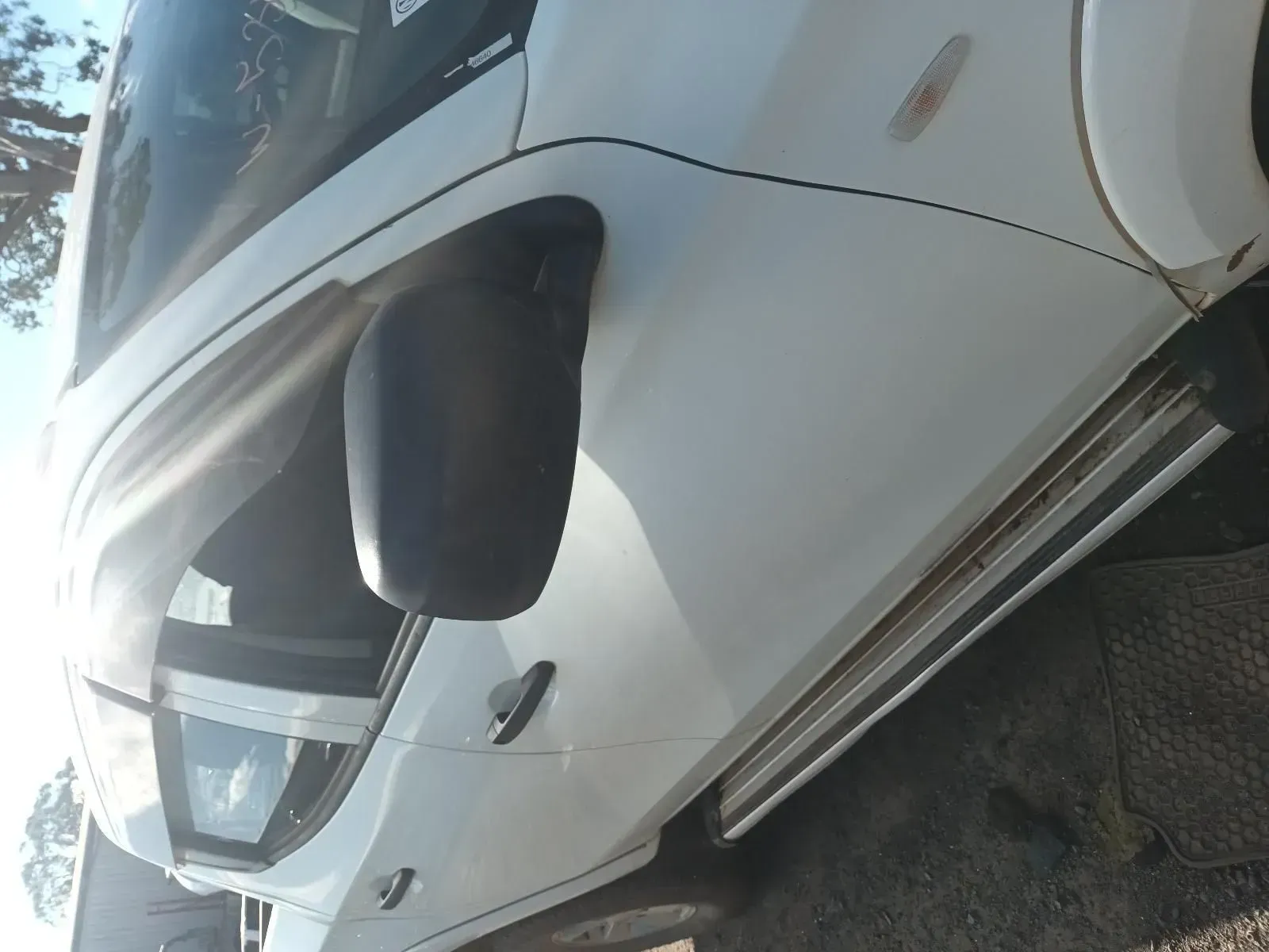 White Vehicle With Black Side Mirror and Silver Running Board — South West 4WD Wreckers In Brisbane, QLD