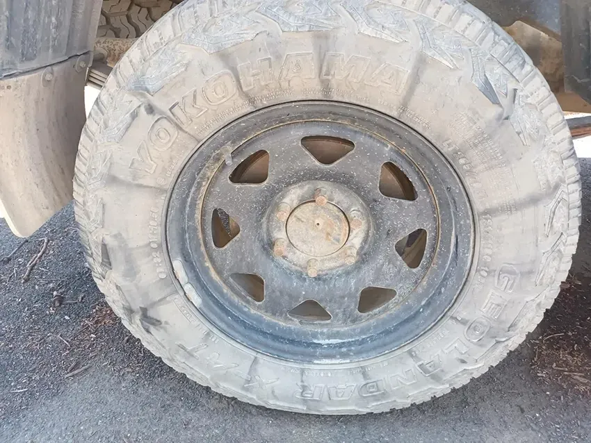 A Close Up of a Tire on a Car on the Ground — South West 4WD Wreckers In Brisbane, QLD