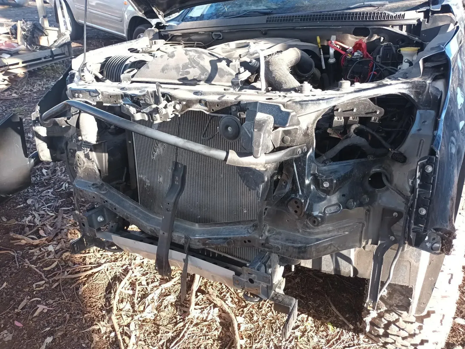 Damaged Black Truck Front End, Showing Engine and Radiator — South West 4WD Wreckers In Brisbane, QLD