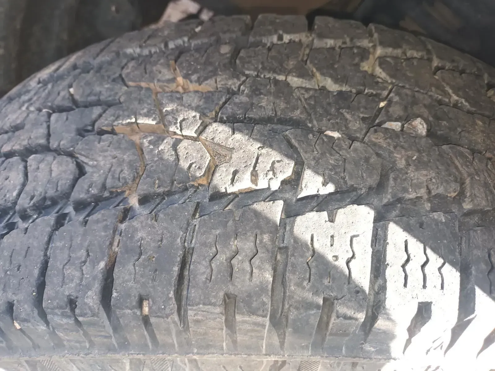 Close-up of a Worn Tyre With Visible Tread and Surface Cracks — South West 4WD Wreckers In Brisbane, QLD