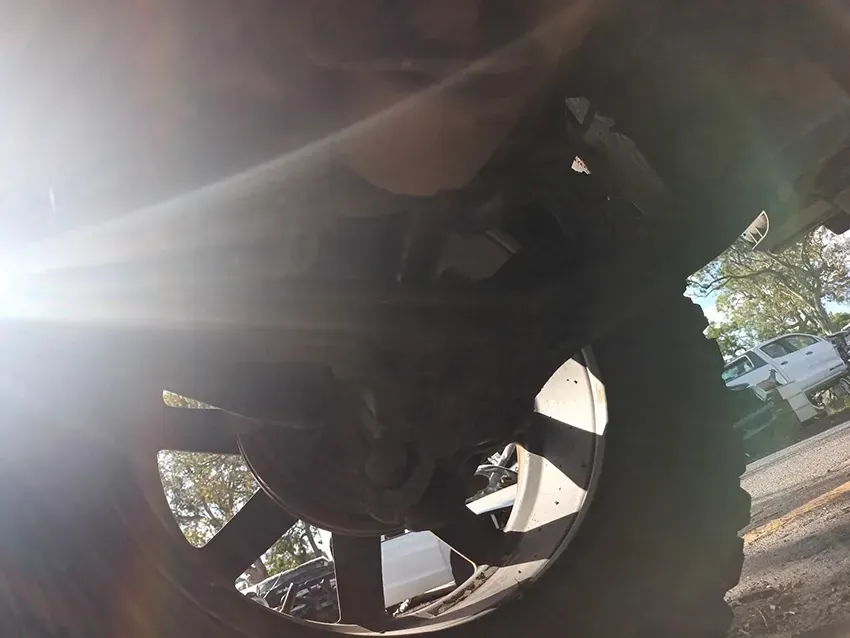 A Close Up of a Car Wheel with the Sun Shining Through It — South West 4WD Wreckers In Brisbane, QLD