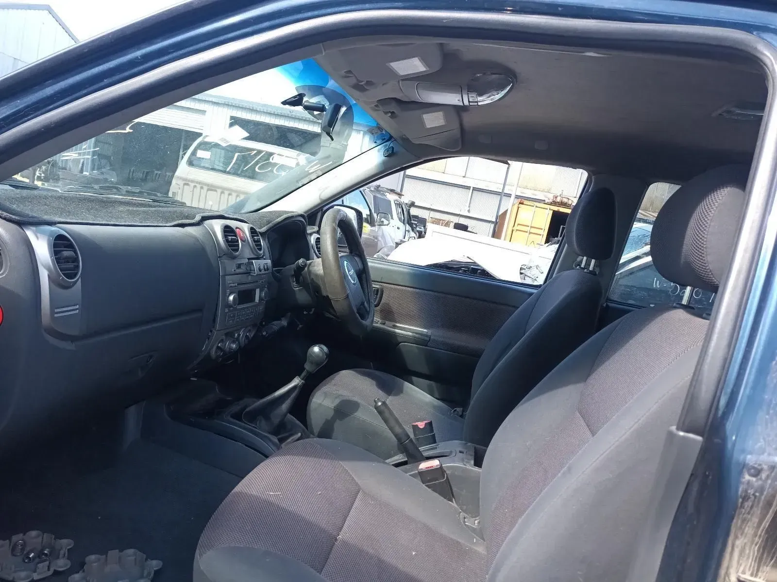 Interior View of a Blue Car With Gray Seats and Dashboard — South West 4WD Wreckers In Brisbane, QLD