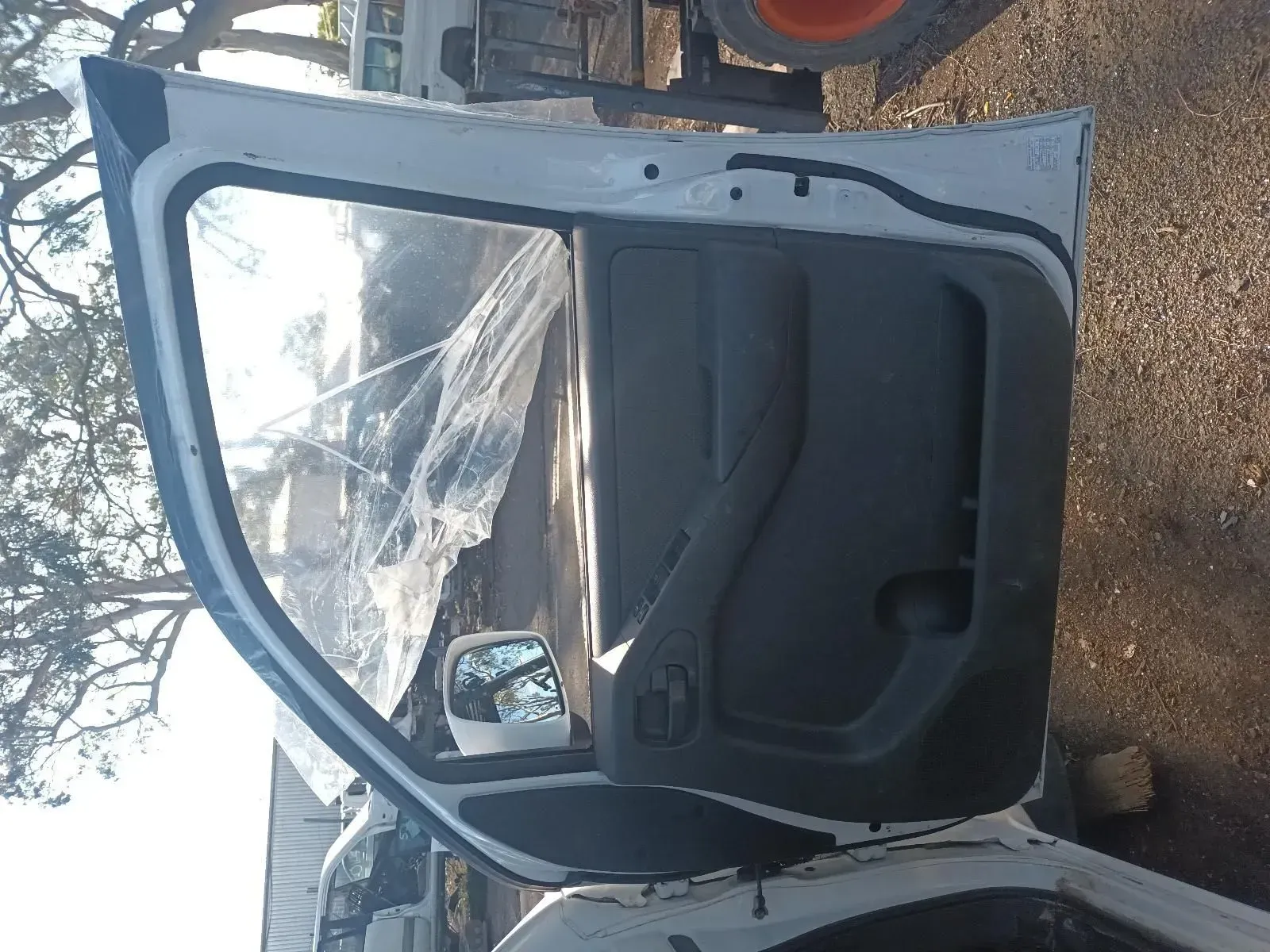 White Car Door With Broken Window Glass, Outdoors — South West 4WD Wreckers In Brisbane, QLD