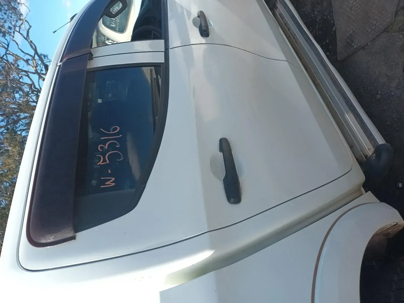 White Pickup Truck Door With Dark Trim, Window Visor, and Running Board — South West 4WD Wreckers In Brisbane, QLD