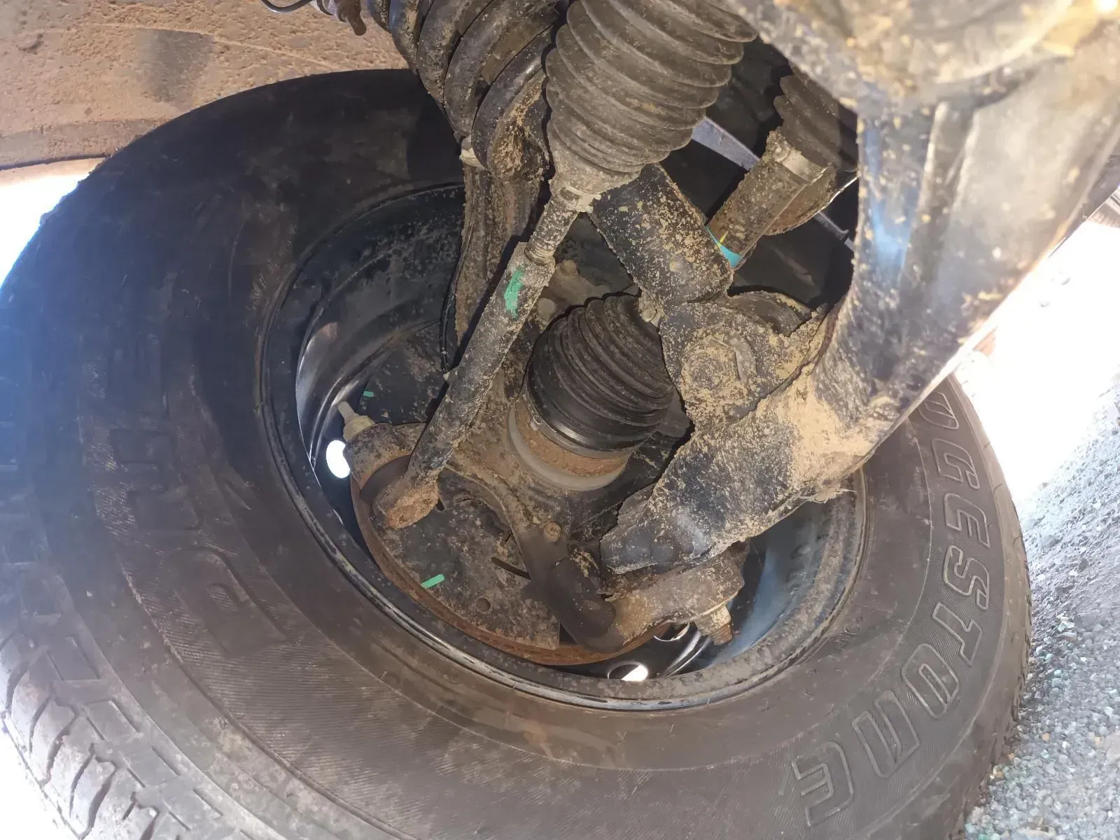 Muddy Car Wheel Assembly — South West 4WD Wreckers In Brisbane, QLD