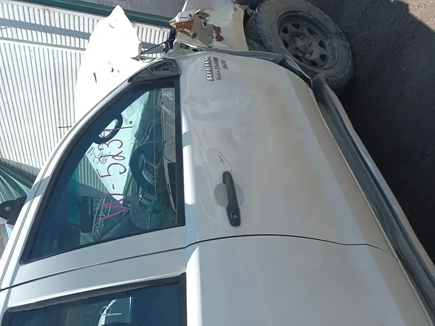 A White Truck is Sitting on the Side of the Road — South West 4WD Wreckers In Brisbane, QLD