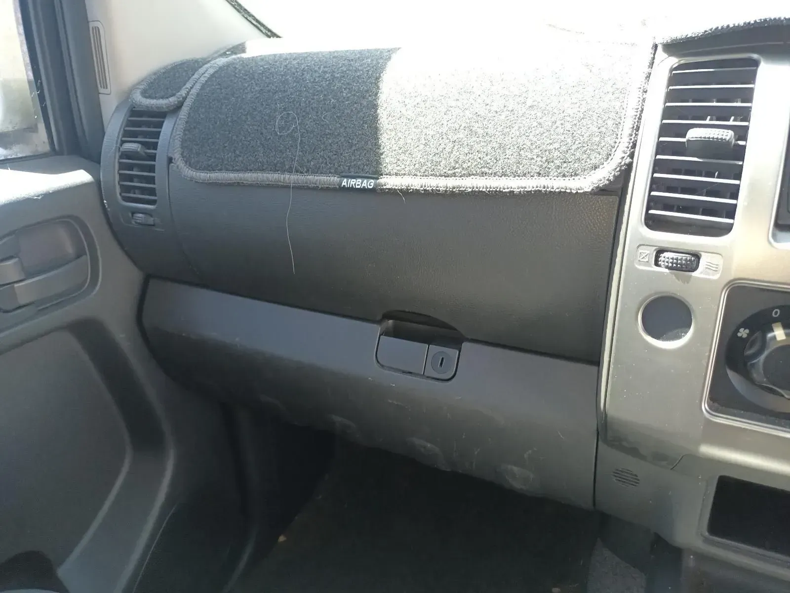 Dashboard of a Car With a Black Glove Compartment — South West 4WD Wreckers In Brisbane, QLD