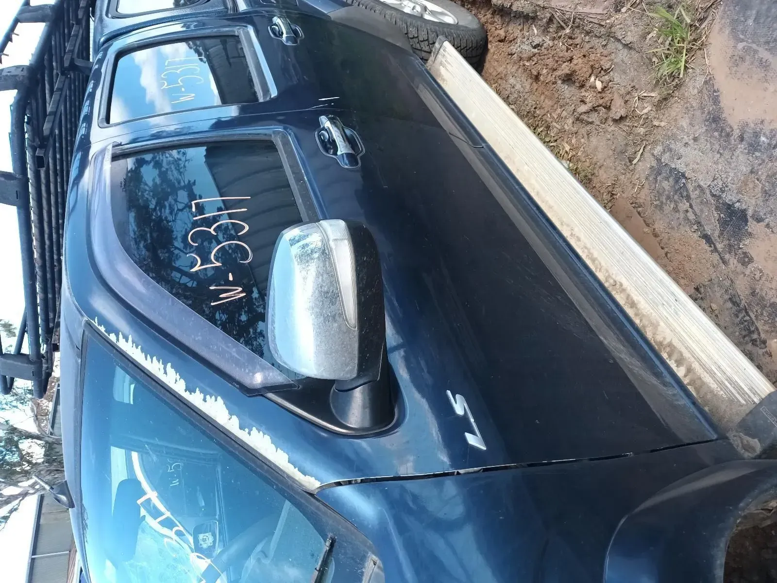 Dark Blue Pickup Truck With Side Mirror, Parked Outside — South West 4WD Wreckers In Brisbane, QLD