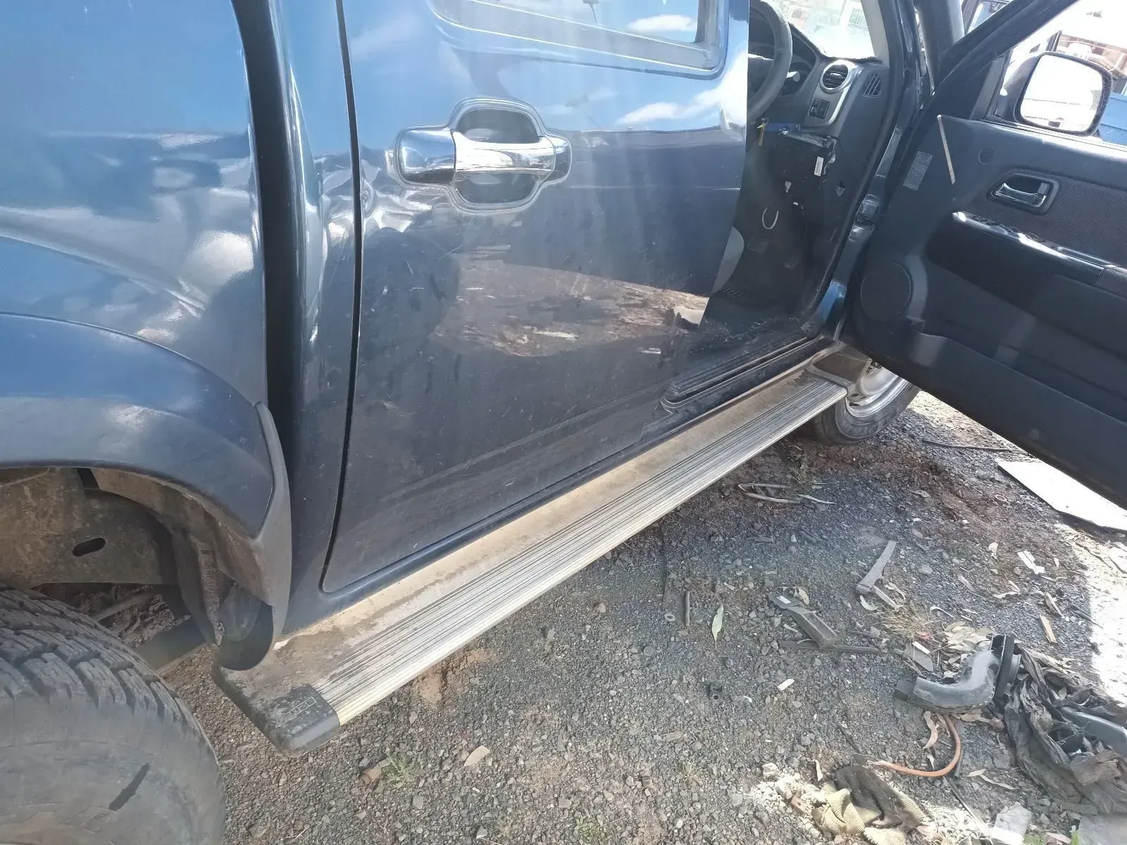 Gray Pickup Truck With Open Door, Showing Running Board — South West 4WD Wreckers In Brisbane, QLD