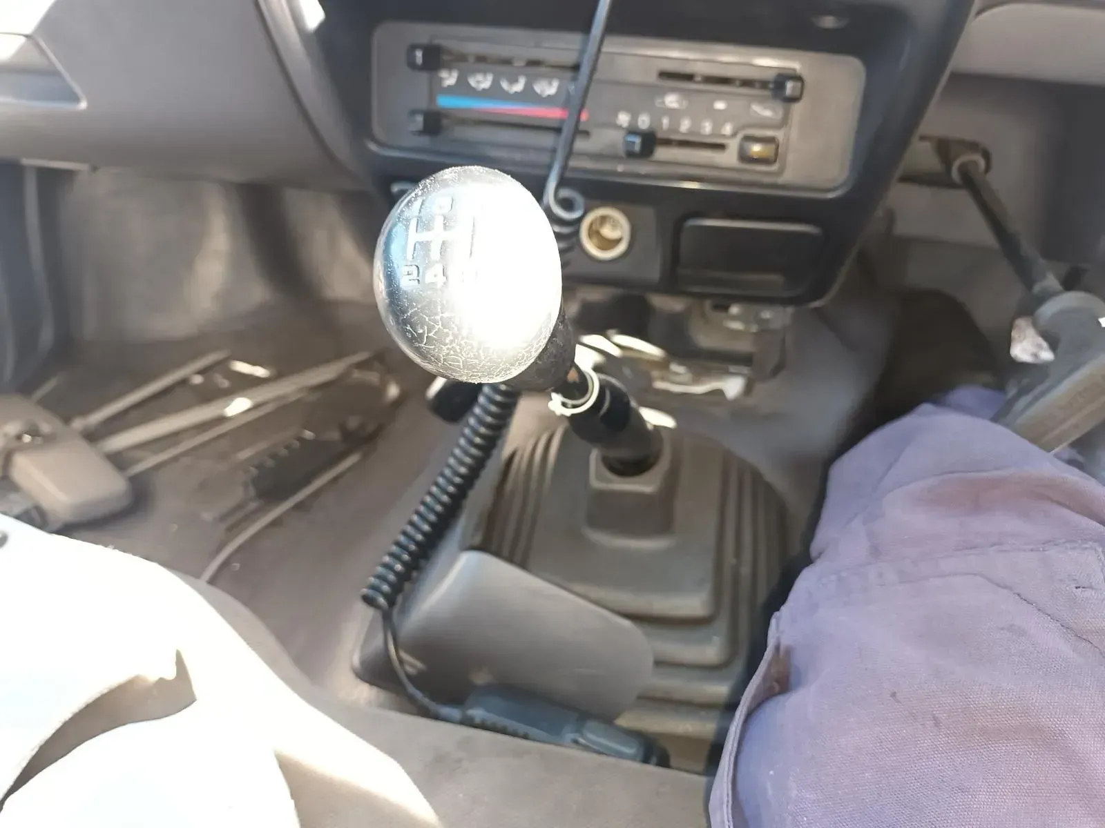 Interior of a Vehicle Showing Gear Shift, Radio, and Driver's Leg — South West 4WD Wreckers In Brisbane, QLD