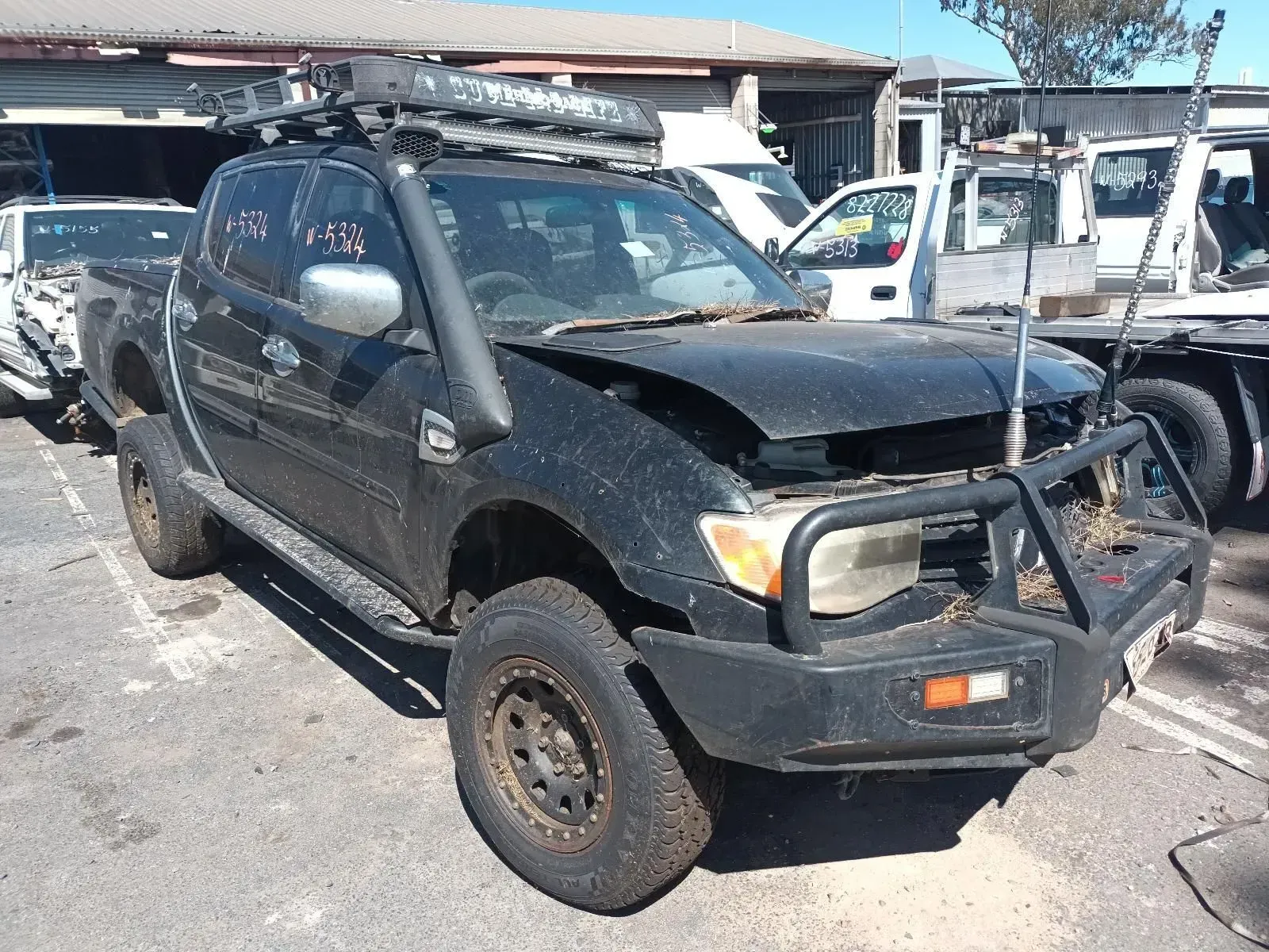 Damaged Black Pickup Truck With Snorkel — South West 4WD Wreckers In Brisbane, QLD