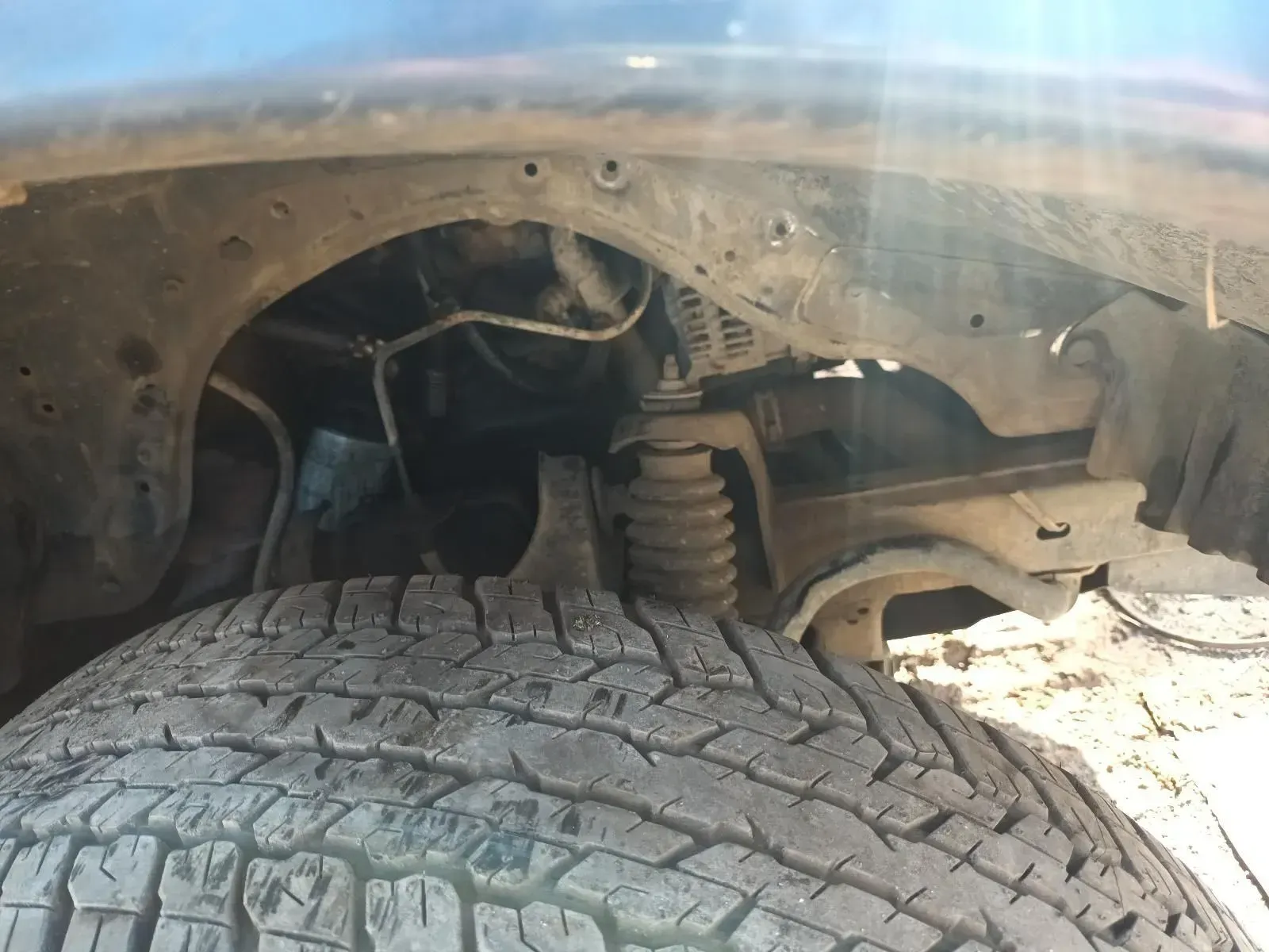 Close-up of a Vehicle's Suspension and Tyre — South West 4WD Wreckers In Brisbane, QLD