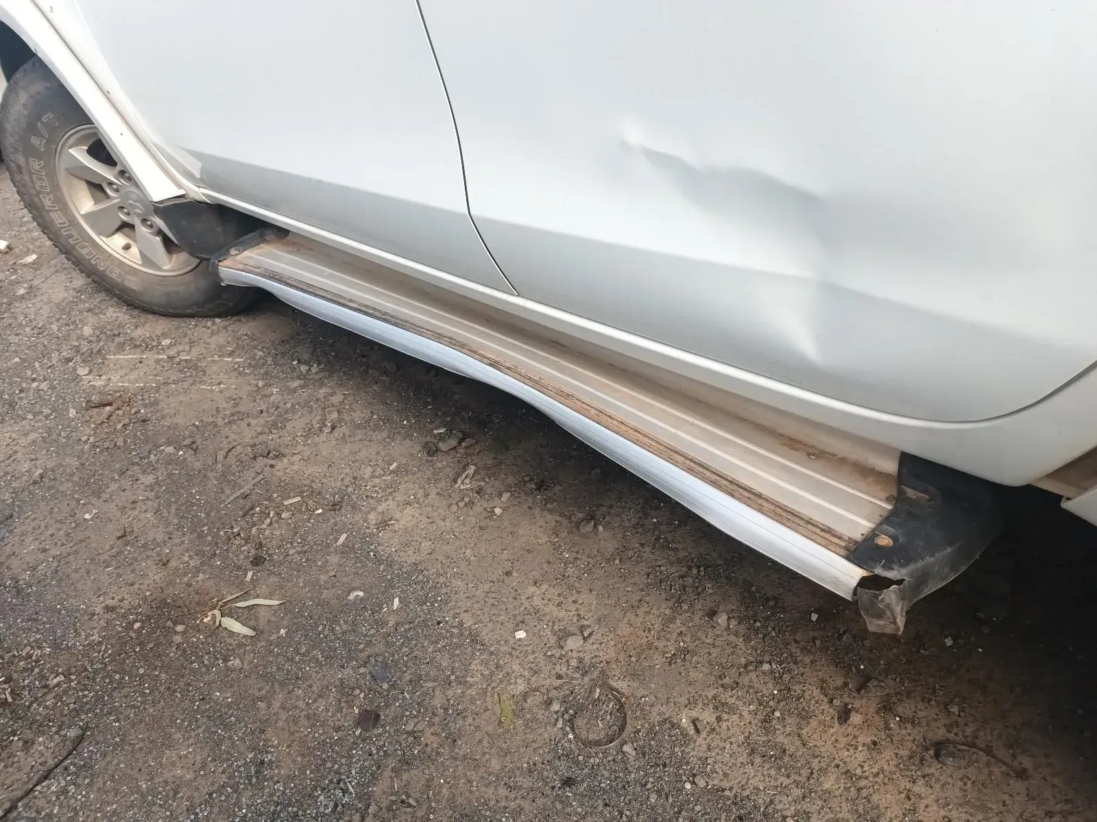 White Truck Side With Dented Door and Damaged Running Board — South West 4WD Wreckers In Brisbane, QLD