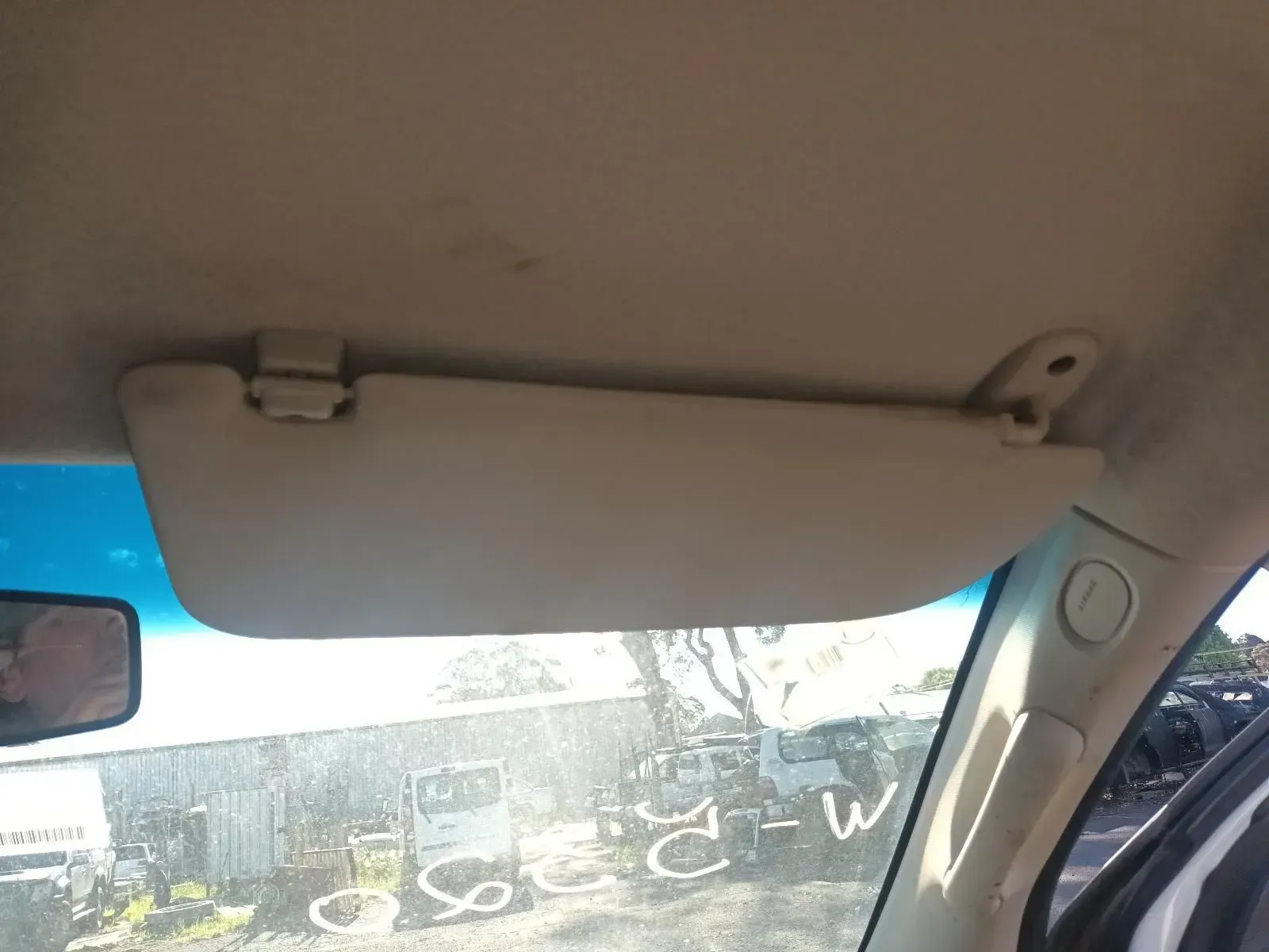 Tan Car Sun Visor Inside a Vehicle — South West 4WD Wreckers In Brisbane, QLD